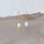 pearl chain drop earrings hanging