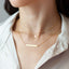Tiny Gold Star Necklace