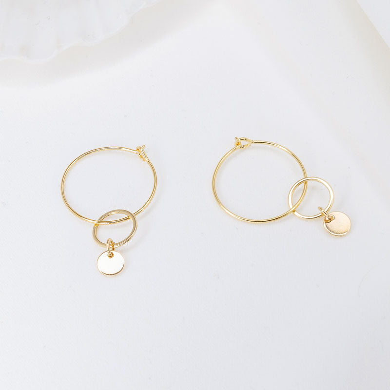 Glamouröse goldene Kreis-Ohrringe – Eleganz in Bewegung