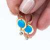 Gold Dangle Earrings with Opal and CZ Charms - Elegance Redefined